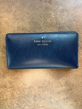 Kate Spade navy Saffiano zip-around continental wallet with gold logo